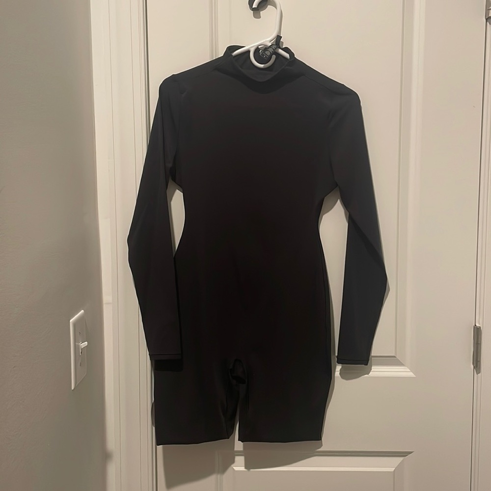 SKIMS black onsie. Never worn. Size M